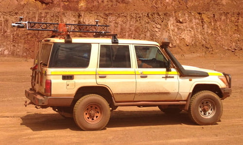Truck mounted with Routescene vehicle LiDAR system surveying in an open cast mine in Australia.