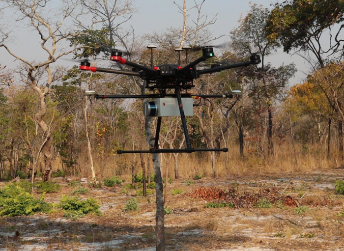 Image of Routescene demonstration UAV LiDAR System mounted underneath DJI M600 Pro in Angola.