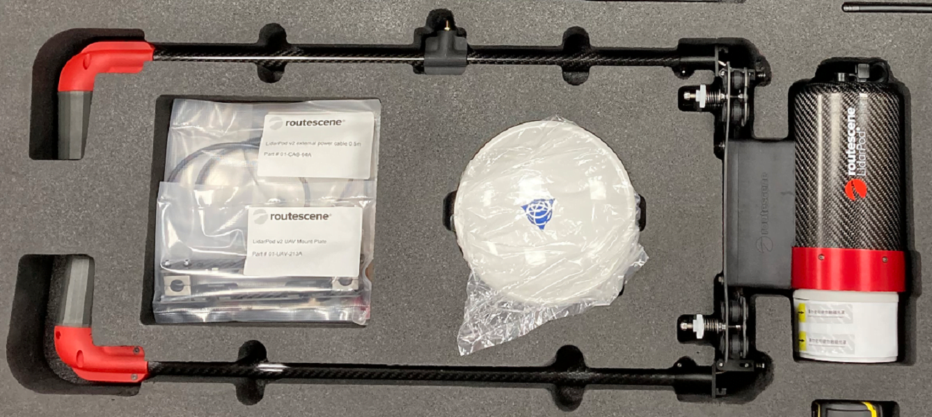 Image of UAV LiDAR System boxed showing new hinged and folded GNSS antenna poles